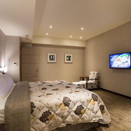 Verygood Business Hotel Huatan Habitación foto