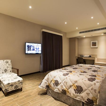 Verygood Business Hotel Huatan Habitación foto