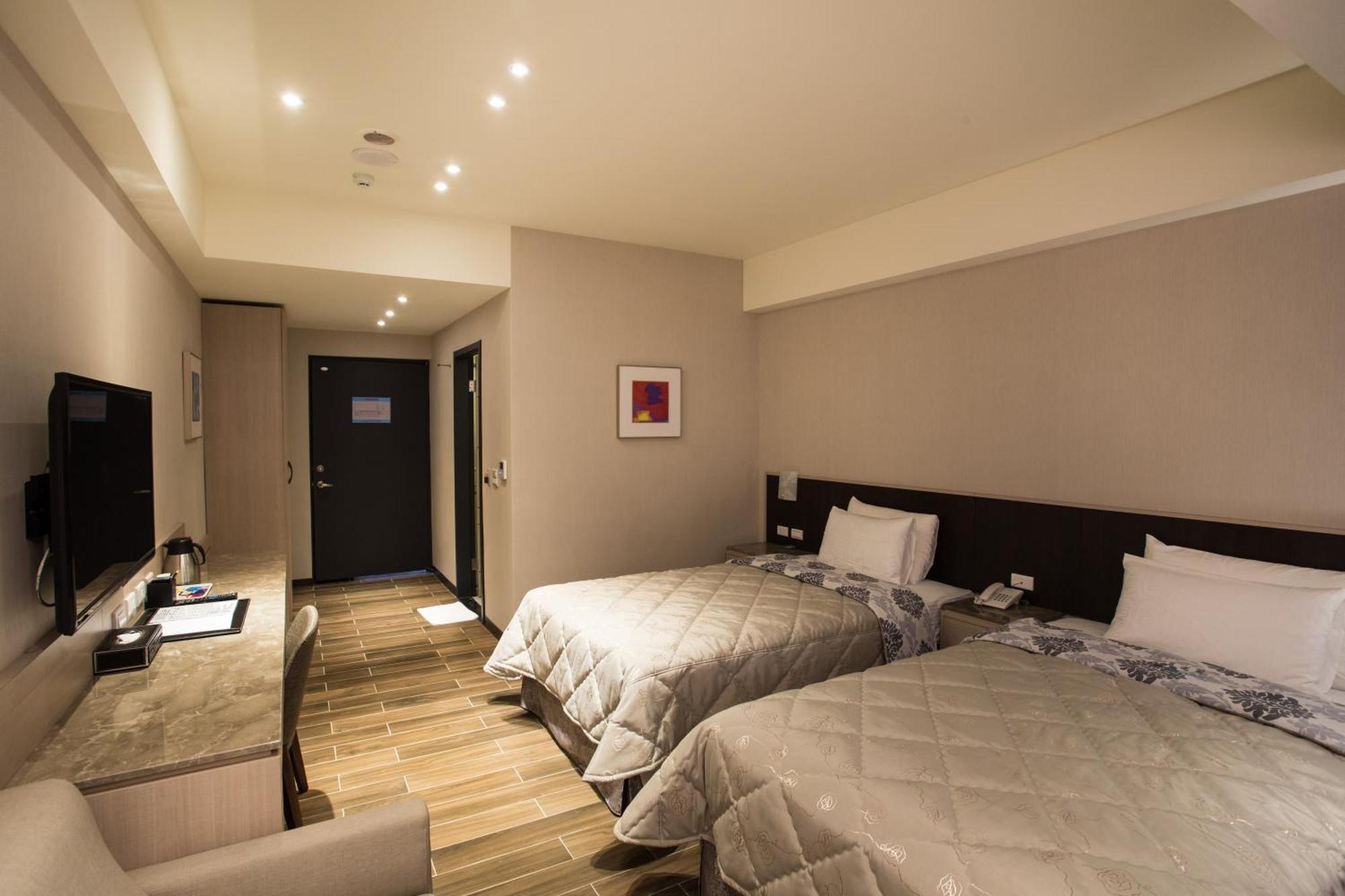 Verygood Business Hotel Huatan Habitación foto
